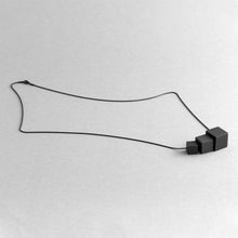 Load image into Gallery viewer, Detail of black MODULOTRE necklace