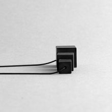 Load image into Gallery viewer, Detail of black MODULOTRE necklace