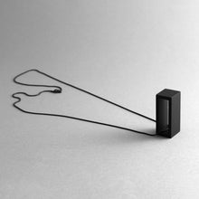 Load image into Gallery viewer, Detail of the Black Rectangle Necklace's pendent with the snake option