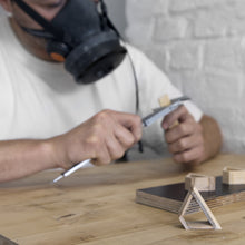 Load image into Gallery viewer, The designer during the handmade project in the Urban Olive Design Studio