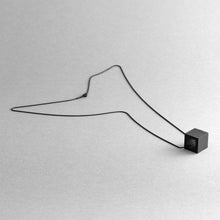 Load image into Gallery viewer, Still life of Elemento necklace in black