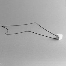 Load image into Gallery viewer, Still life of Elemento necklace in grey