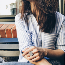 Load image into Gallery viewer, A woman are wearing a contemporary square ring handmade in aluminium