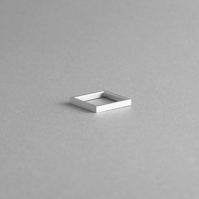 Detail of the aluminium square ring model 01