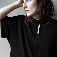 Load image into Gallery viewer, a woman wear Column necklace in a grey background
