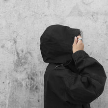 Load image into Gallery viewer, a woman wear a MK3 in the city, in a concrete background