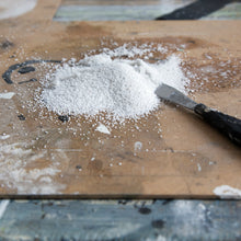 Load image into Gallery viewer, Carrara marble powder on a wood table