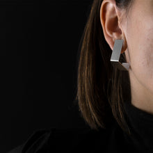Load image into Gallery viewer, woman are wearing Silver Square Earrings with black background
