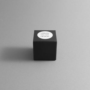 Cube earrings black product packaging