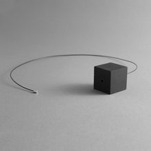 Load image into Gallery viewer, Detail of the Black Cube Necklace&#39;s magnetic chain 