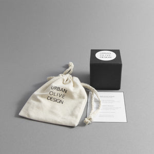 Gift box with a Certificate of Authenticity and a drawstring pouch made of organic cotton